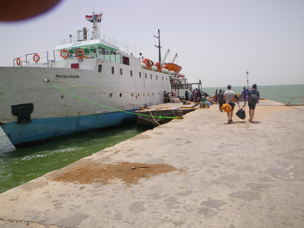 Hauling our luggage down to the ferry