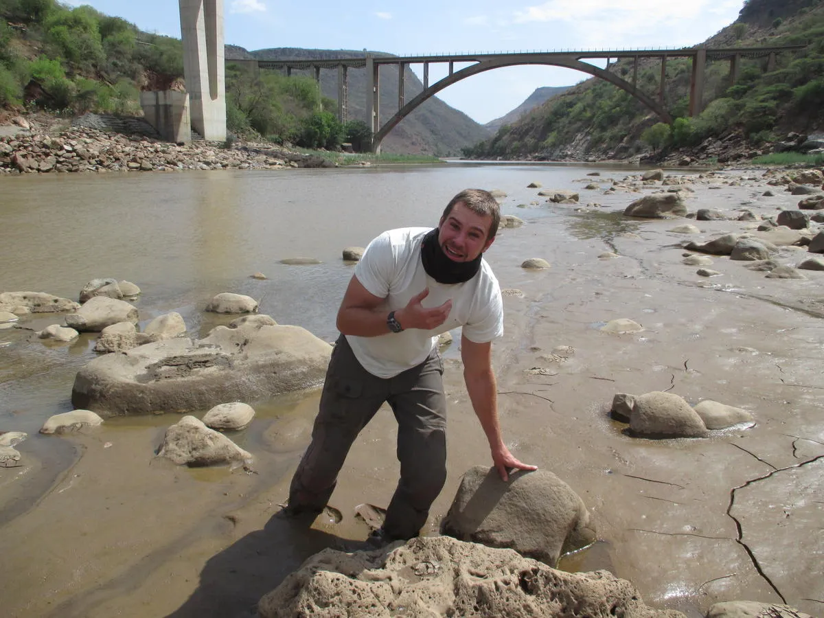 Kyle mucking about in the Nile mud